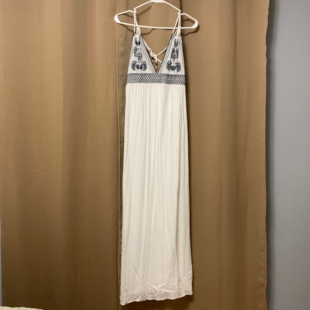 White maxi dress with navy trim detail